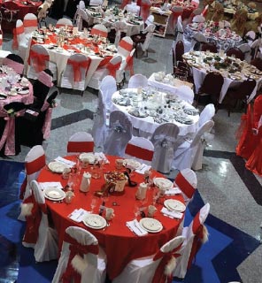 Overview of multiple decorated tables at the Tea in the Trees event.